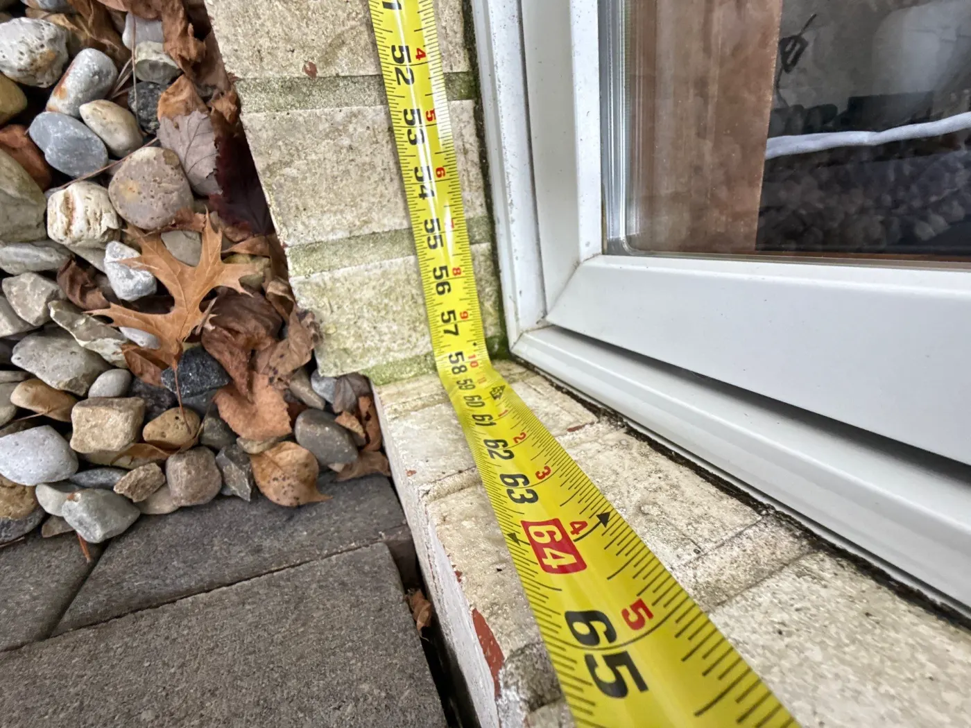 Storm-damaged window documented in Bellwood